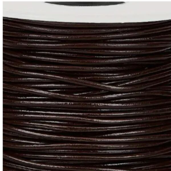 Close-up image of 1.5mm 5m coconut brown cowhide leather cord coiled neatly, showcasing its smooth texture and genuine leather quality, perfect for jewelry making and crafting.