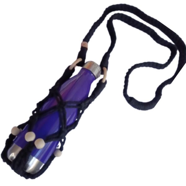 Macramé drink bottle bag with a knotted design and shoulder strap, holding a reusable bottle.