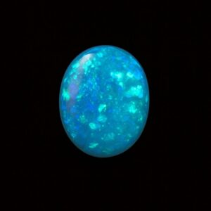 Image is of a boulder opal doublet with bright blue hue
