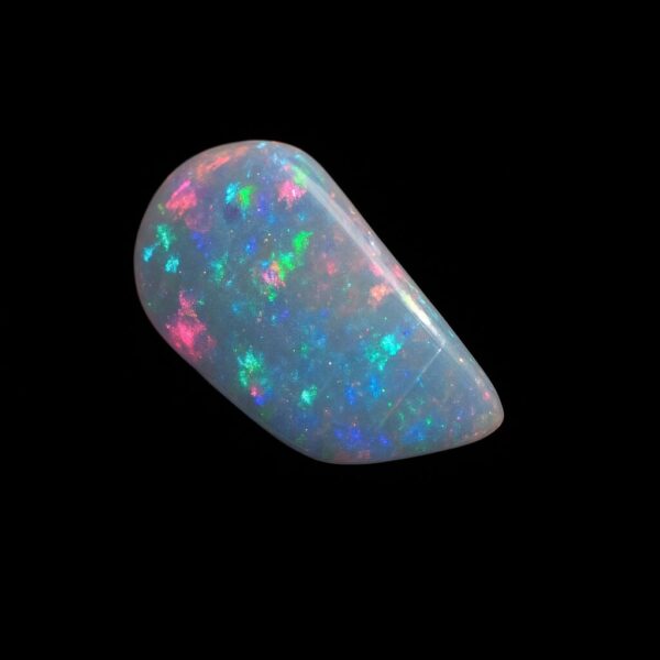 Image is of a boulder opal with vibrant rainbow flecks