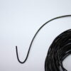 Close-up image of 3mm 5m Brown leather cord neatly coiled, highlighting its smooth texture, durability, and genuine leather quality, perfect for jewelry making and crafting.