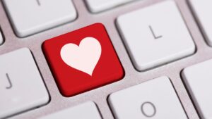 Image is of a Love heart keyboard key with the text Legal Information & Policies on it