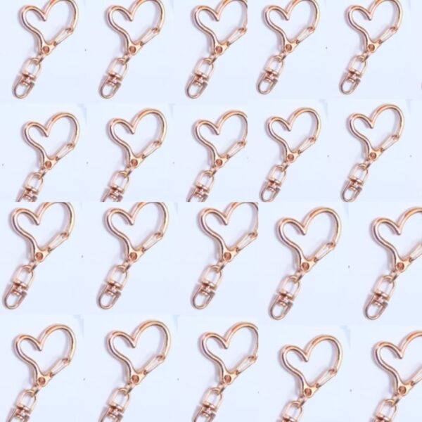 Close-up image of 10PCS swivel heart gold Lobster Swivel Clasp Hooks, showcasing their durable metal alloy construction, gold finish, and 360-degree swivel design.