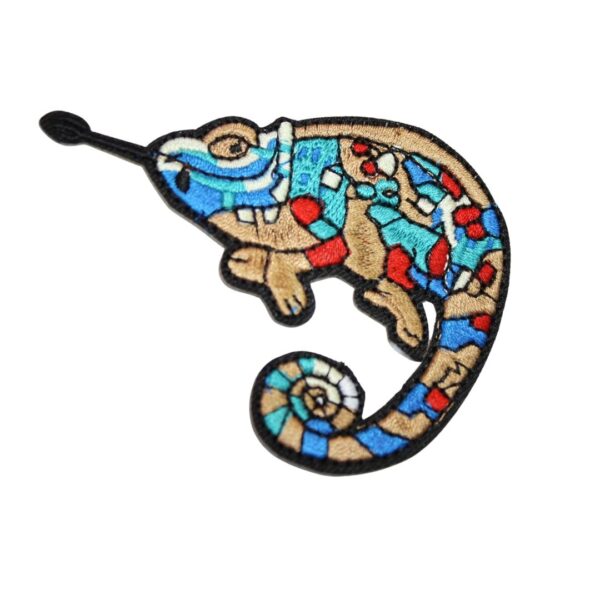 A rainbow ghecko embroided iron on patch, perfect for personalizing clothing, bags, and accessories. Easy to apply with heat, adding a retro touch to any project.
