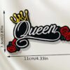 A Queen embroided iron on