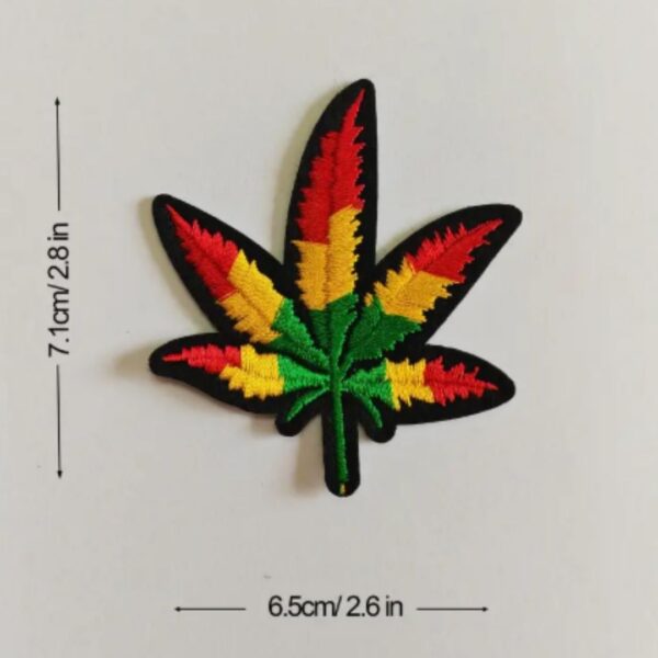 A RASTA MARIJUANA embroided iron on patch, perfect for personalizing clothing, bags, and accessories. Easy to apply with heat, adding a retro touch to any project.