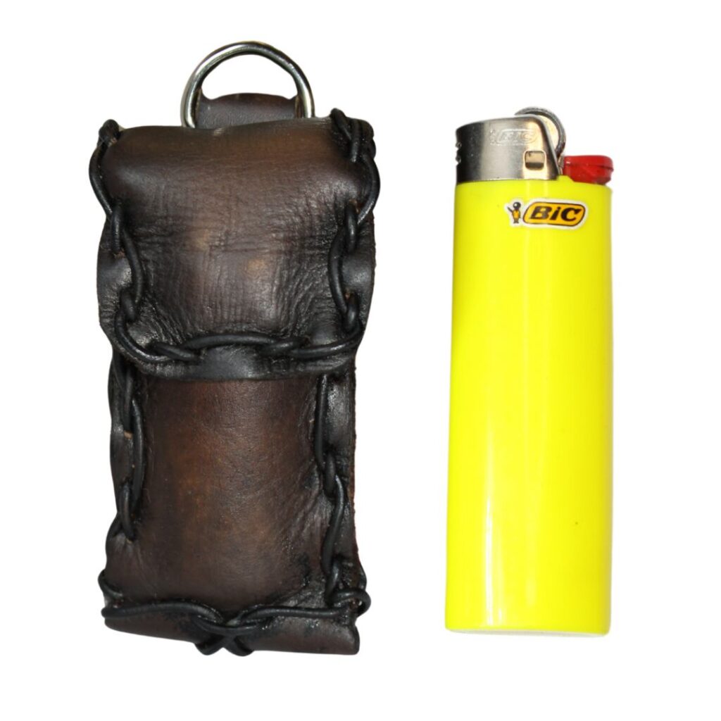 Image is of a leather lighter pouch with magnetic clasp and keyring with a yellow lighter 