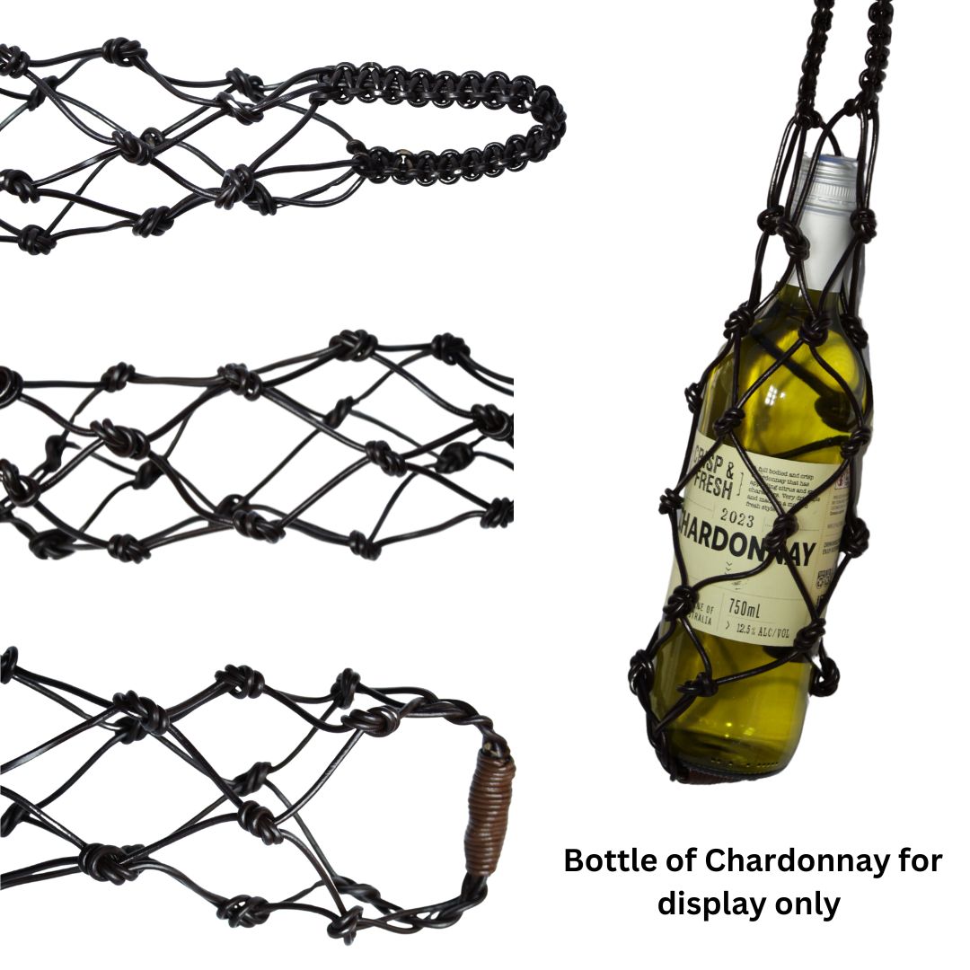 Image is of a leather cord wine carrier bag and a display bottle of fake wine 