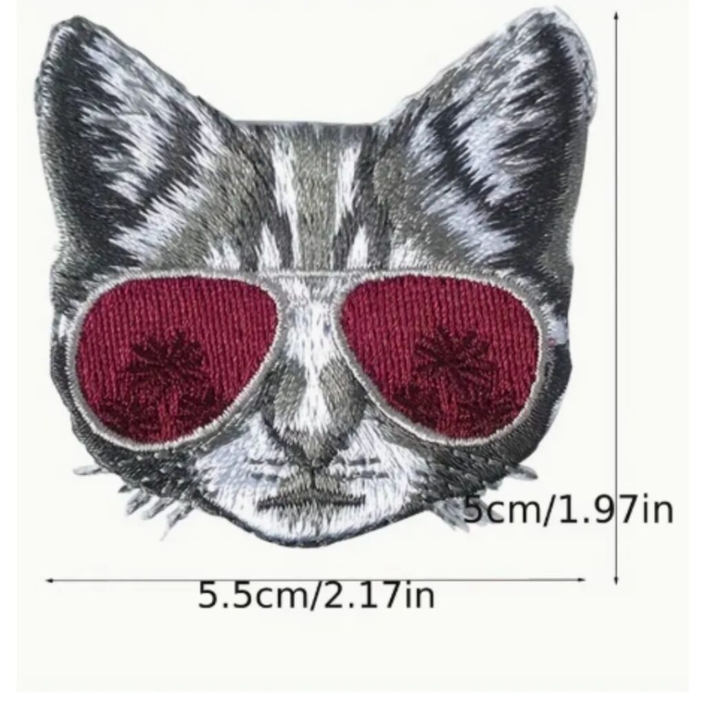 Image of iron on embroider patches  of a cat and dimensions in text 